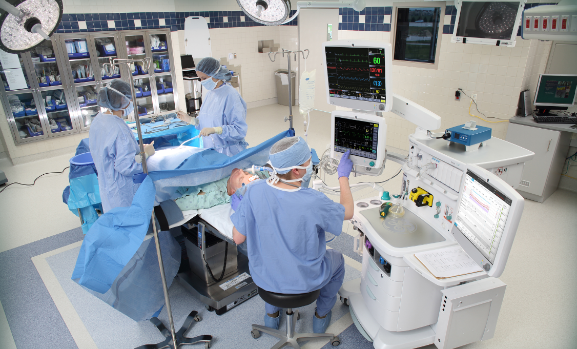 Advances In Low Flow Anesthesia The Path To Automation Clinical View   Clinicians Operating A Patient 